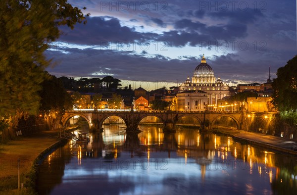 View from Ponte Umberto I across the Tiber River to Ponte Sant'Angelo and St. Peter's Basilica