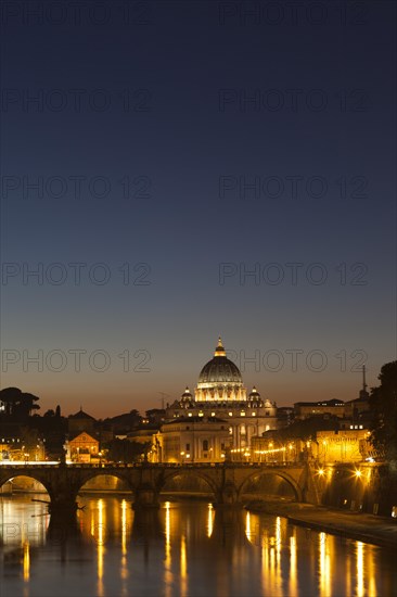 St. Peter's Basilica with the Tiber River at dusk