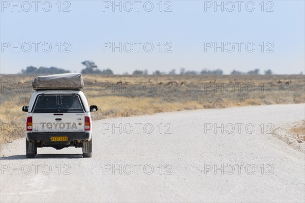 Toyota parking at the roadside