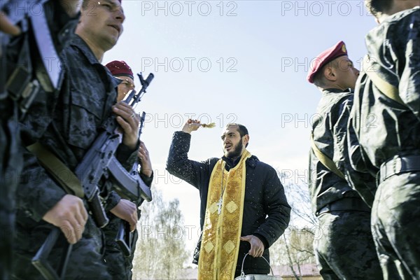 Swearing-in ceremony of volunteers after a three-week military training