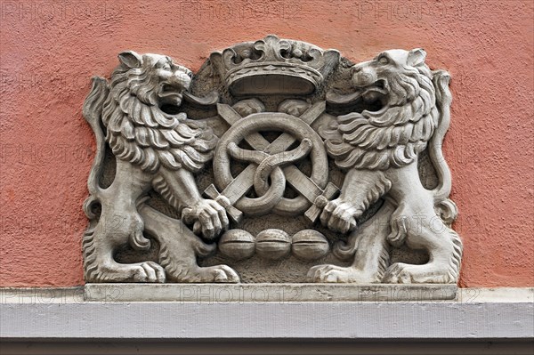 Guild sign of the bakers on a bakery