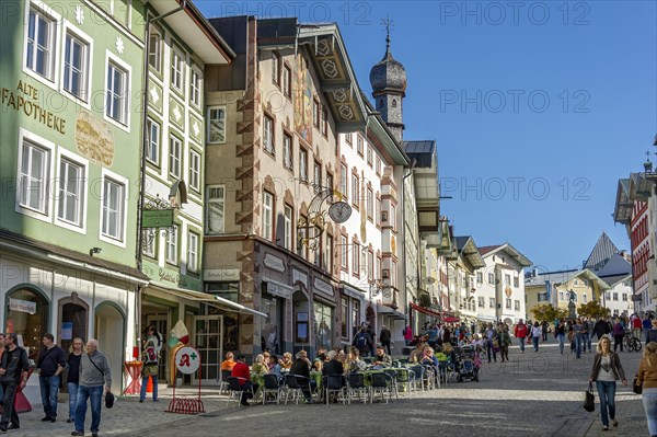 Row of houses and street cafes at the Marktstrasse street