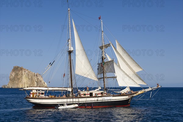 Yacht sailing off Isola Dattilo