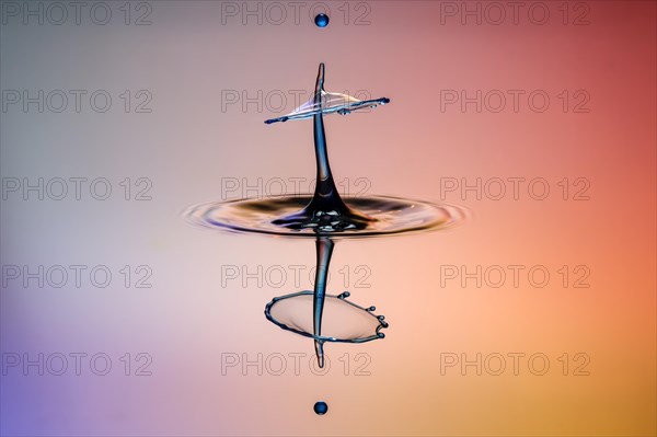 Three drops collide