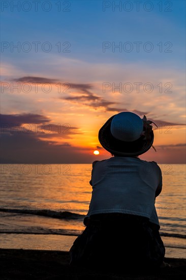 Woman watching the sunset