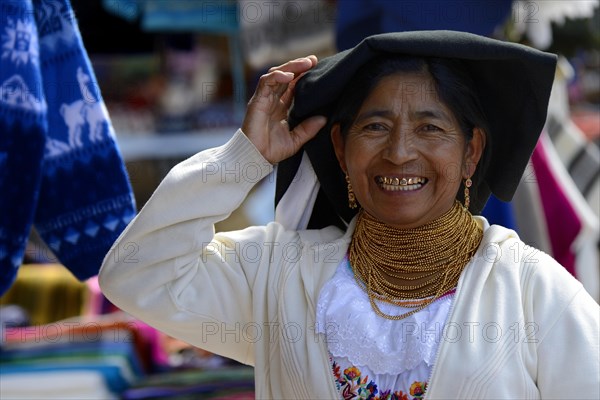 Market woman wearing a traditional Ecuadorian costume