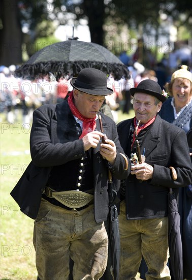 Men wearing traditional costumes