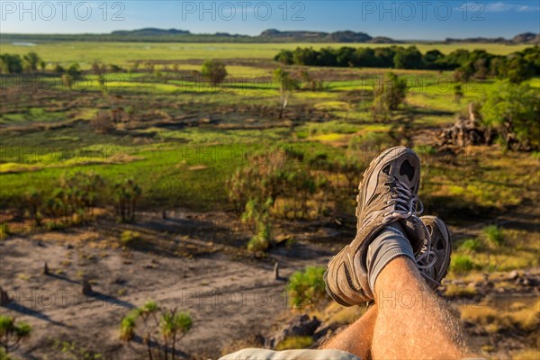 Man's legs with view of Nadab floodplain