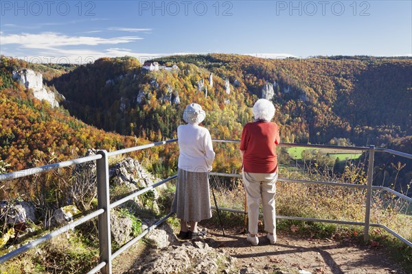 Two elderly ladies looking at the view over Danube Gorge from Burg Wildenstein Castle