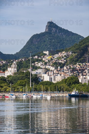 Christ the Redeemer statue with Rio de Janeiro at the front