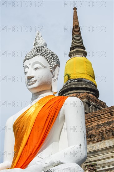 Buddha statue in front of the stupa at Wat Yai Chai Mongkhon