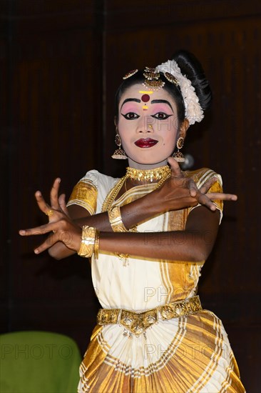 Fully made-up and costumed Kathakali dancer during a performance