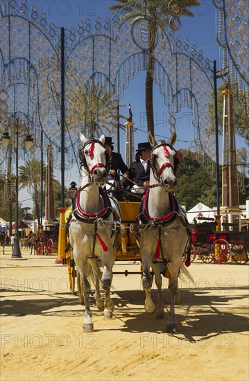 Decorated horses and dressed up coachmen at the Feria del Caballo Horse Fair