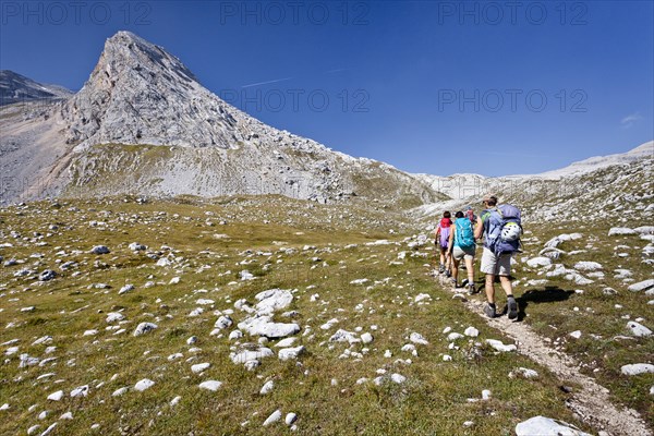 Hikers during the ascent of Piz de Lavarela