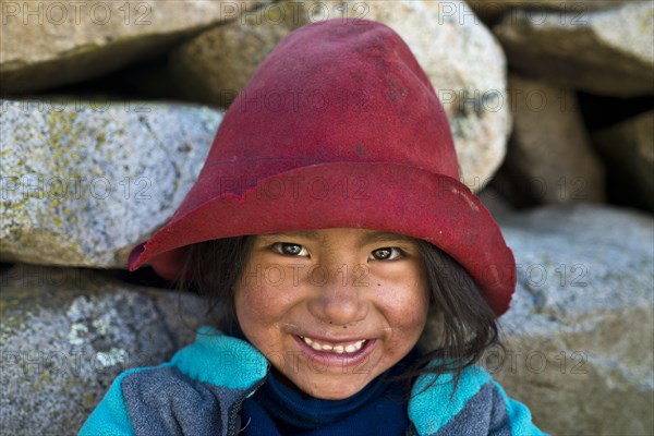 Smiling girl wearing a hat