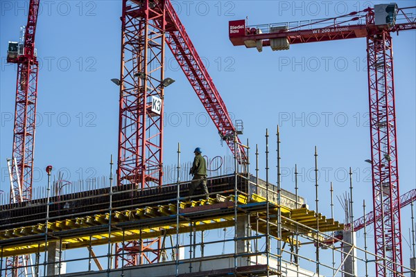 Construction cranes at a construction site