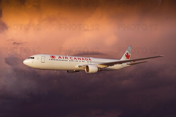 Air Canada Boeing 767-333 ER in flight in a storm