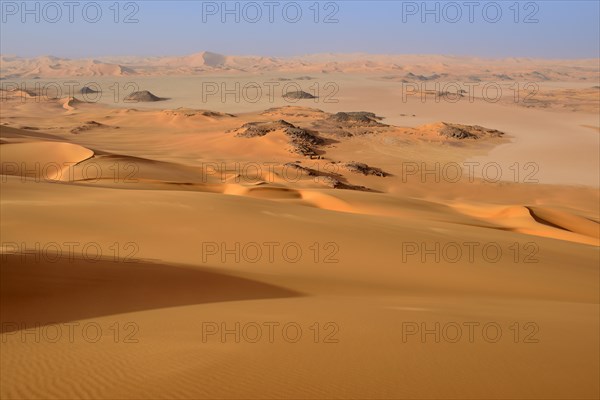 Claypan or playa and sand dunes of Oued In Djerane