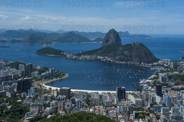 Outlook from the Christ the Redeemer statue over Rio de Janeiro and the Sugar Loaf