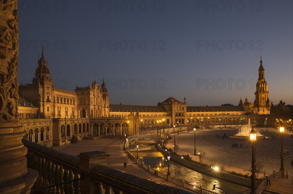 The illuminated Plaza de Espana at dusk