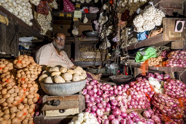 Man selling potatoes and onions at Crawfort Market