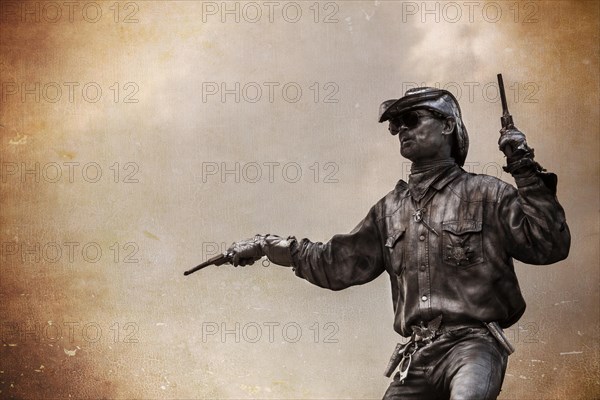 Berlin street artist dressed as a cowboy