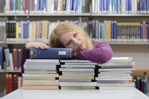 Student studying in the departmental library of the University of Hohenheim in Schloss Hohenheim Palace