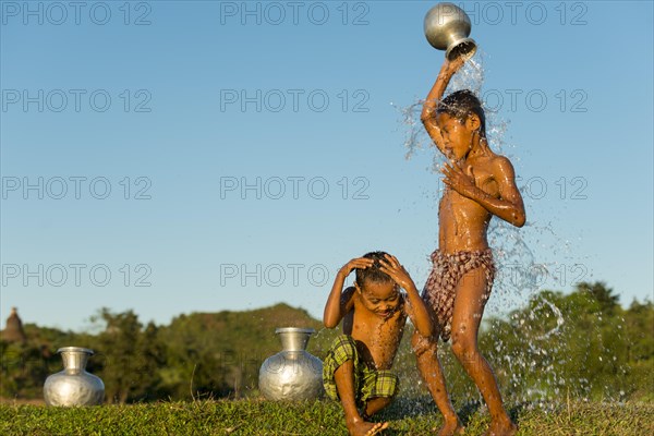 Boys washing themselves