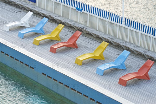 Deckchairs beside the pool at Parnell Baths