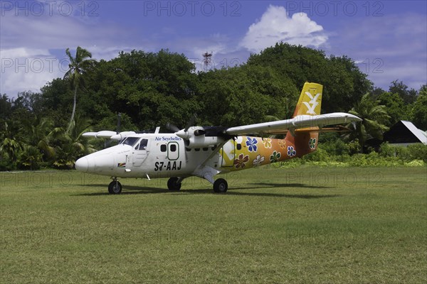 Aircraft 'Twin Otter' of the AIR SEYCHELLES airline at the airport of Denis Island