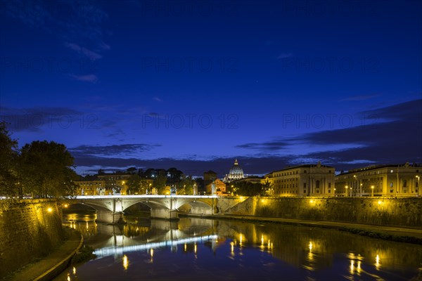 View across the Tiber river to St. Peter's Basilica