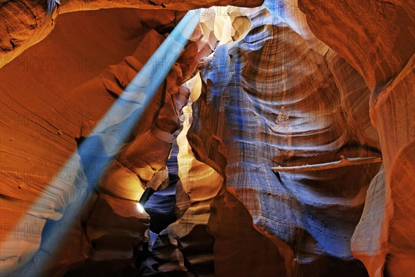 Rays of light falling on yellow-red sandstone formations