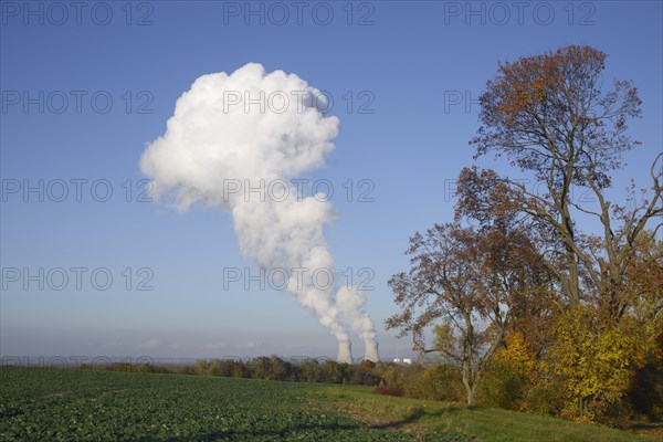 Mushroom-shaped cloud over the cooling towers of the Gundremmingen nuclear power plant