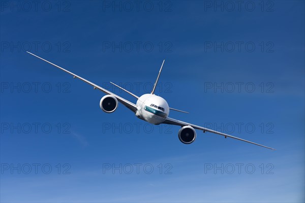 Cathay Pacific Boeing 777-367 ER in flight