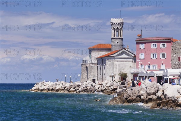 Promenade with Church of San Clemente