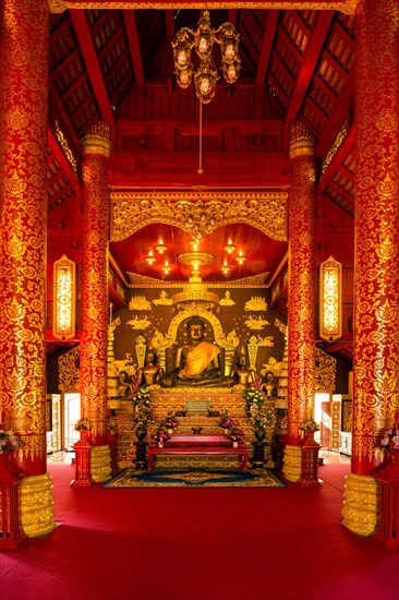 Historical bronze Buddha in the Viharn of Phra Kaeo