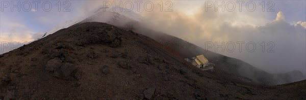 Jose Ribas Hut and the summit of Cotopaxi Volcano