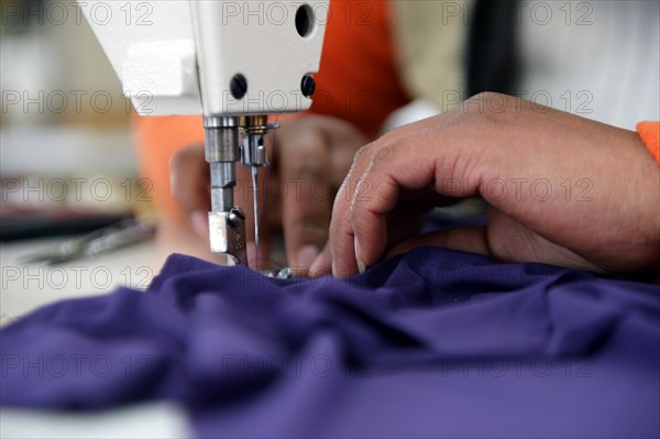 Seamstress working on a sewing machine