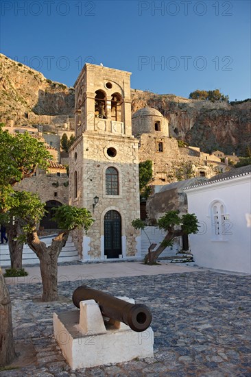 Main square of the lower town with the bell tower of the Byzantine Greek-Orthodox Church of Christ Elkomenos