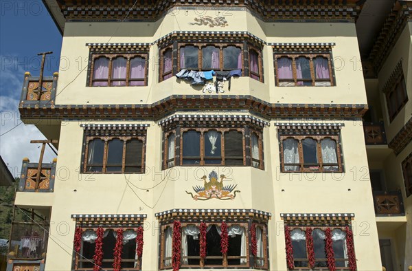 Facade of a residential building with a traditional fresco