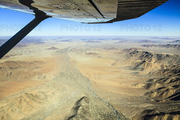 View from a small plane over the foothills of the Namib Desert