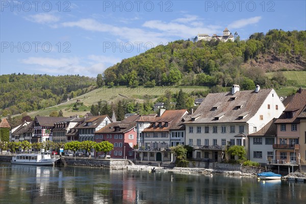 Bank of the Rhine River with a boat landing and Burg Hohenklingen Castle