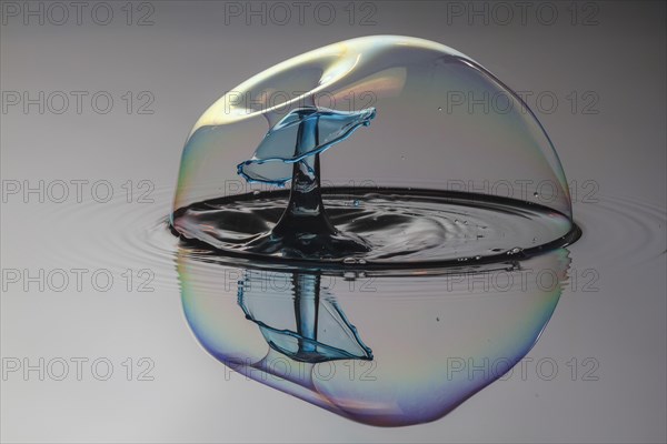 Three drops collide