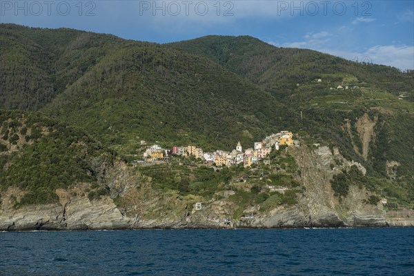 Village with colorful houses by the sea