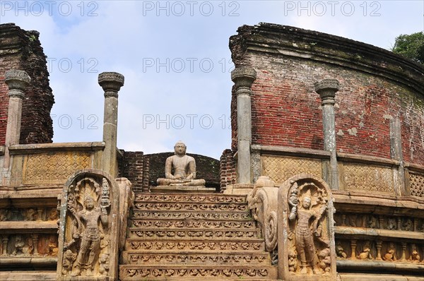 Buddha statue in the round reliquary house of Vatadage