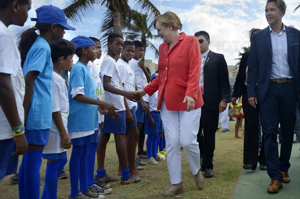 German Chancellor Angela Merkel visiting a social project for children and adolescents run by the German Society for International Cooperation