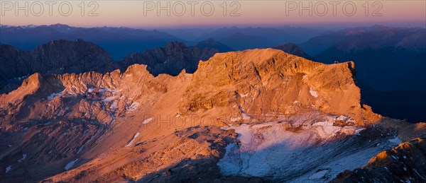 Sunrise view from Mt Zugspitze to Mt Schneefernerkopf