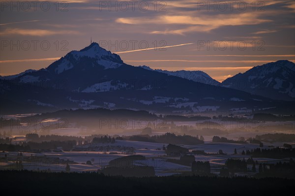 Peak of Mt Grunten with the Alpine foothills at sunset