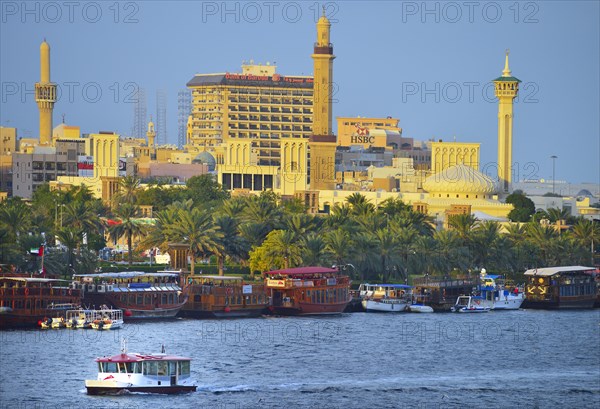 Dhows on the banks of Dubai Creek