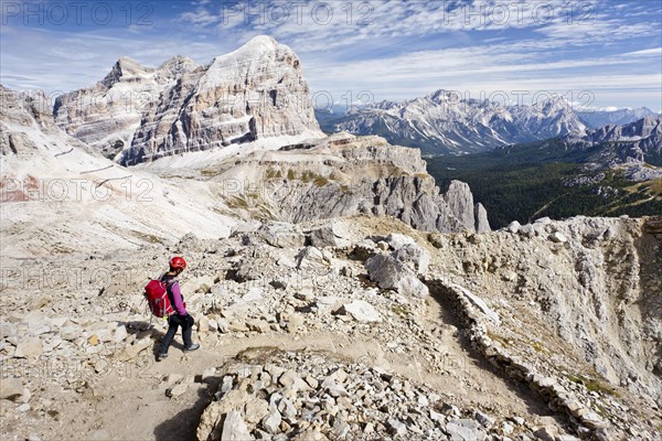 Mountain climber descending from Lagazuoi Mountain in the Fanes Group